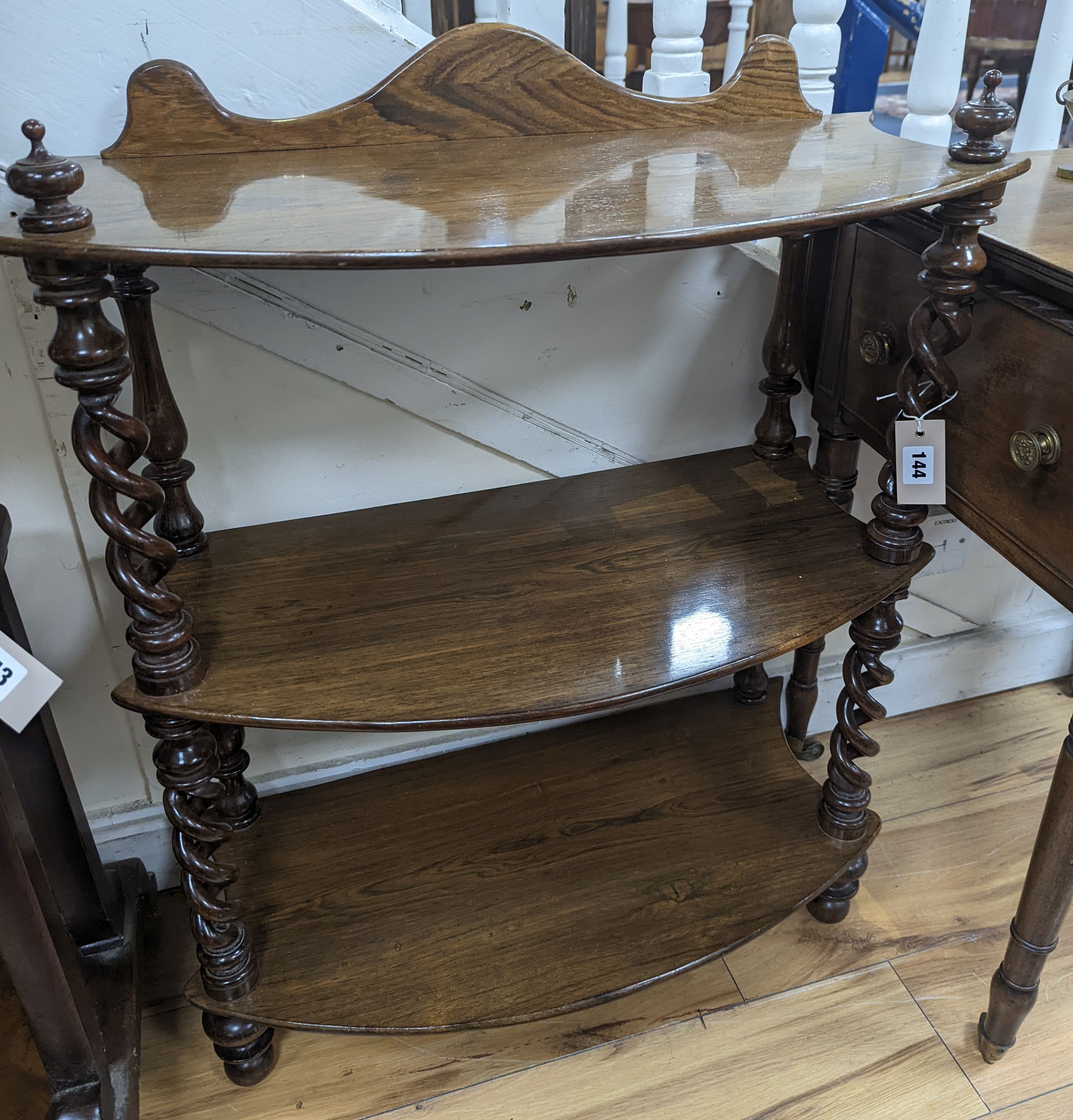 A Victorian Rosewood three tier whatnot. W-70cm, D-32cm, H-73cm.